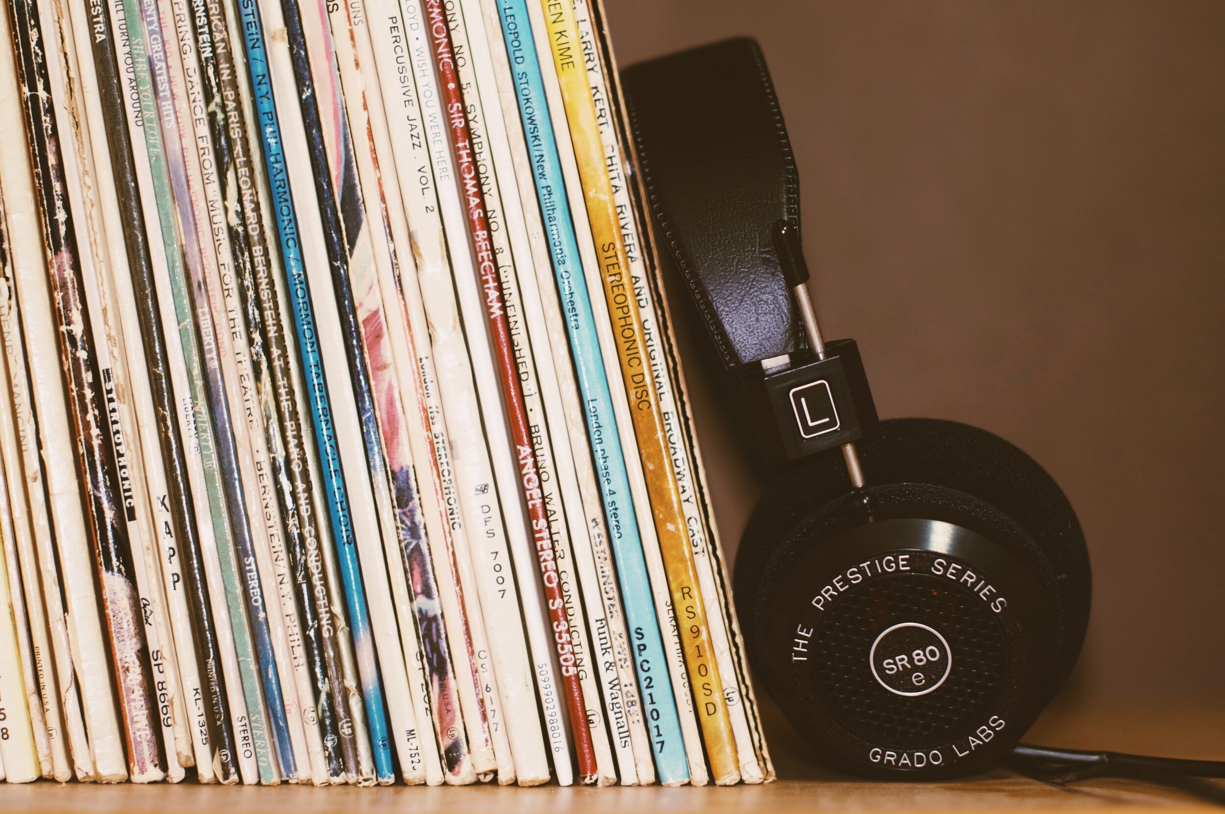 records next to headphone